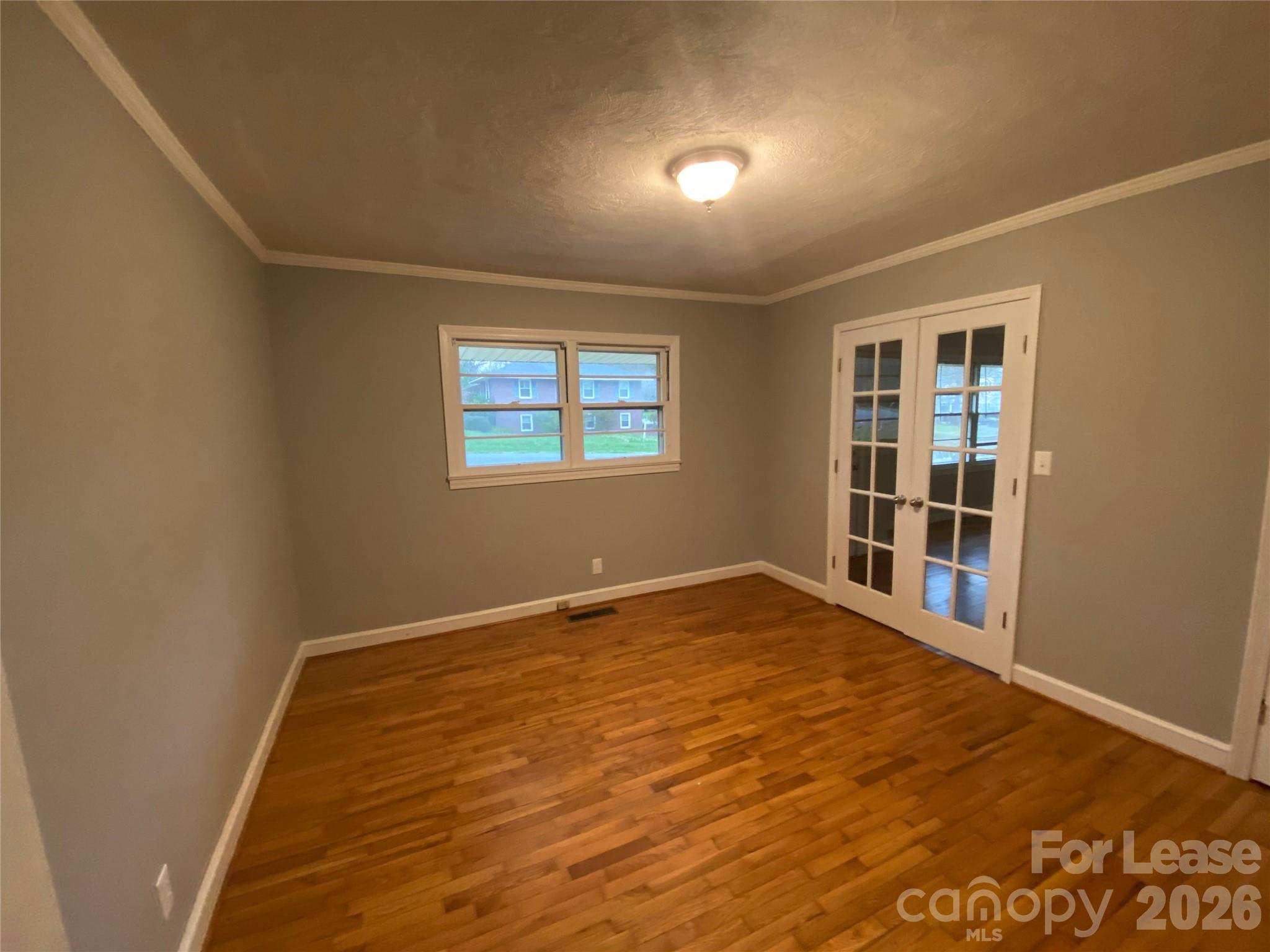 508 Dunham Road Gastonia, NC 28054 - Photo 12 of 16 an empty room with windows