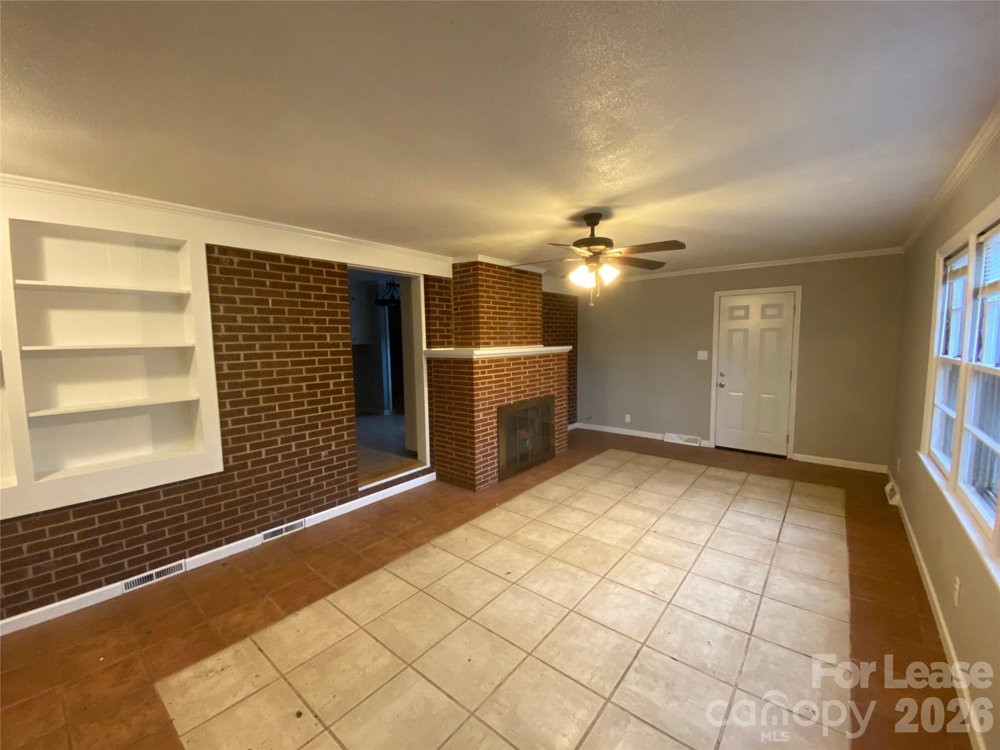 508 Dunham Road Gastonia, NC 28054 - Photo 6 of 16 a view of a livingroom with a staircase