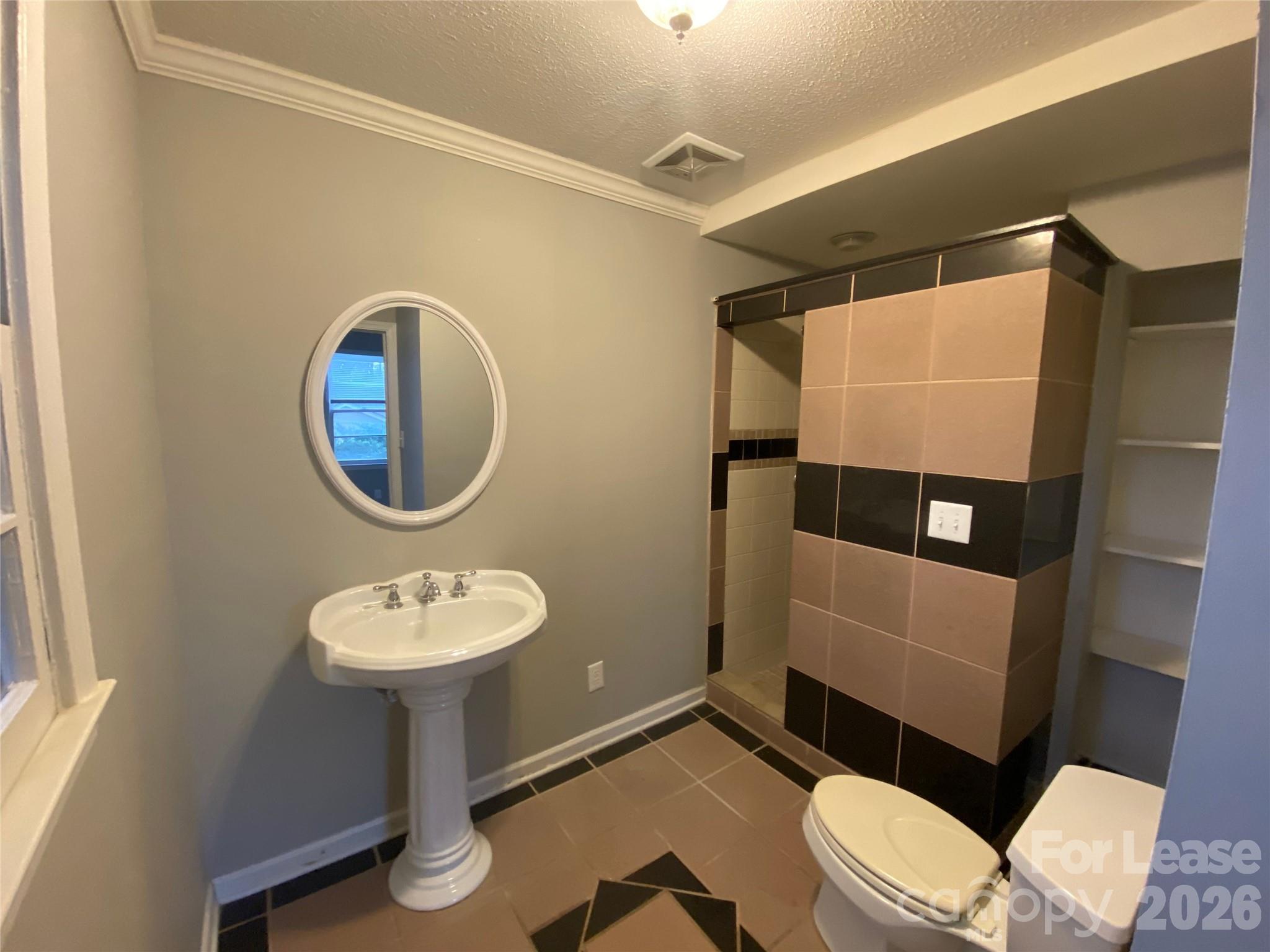508 Dunham Road Gastonia, NC 28054 - Photo 8 of 16 a bathroom with a sink mirror vanity and toilet