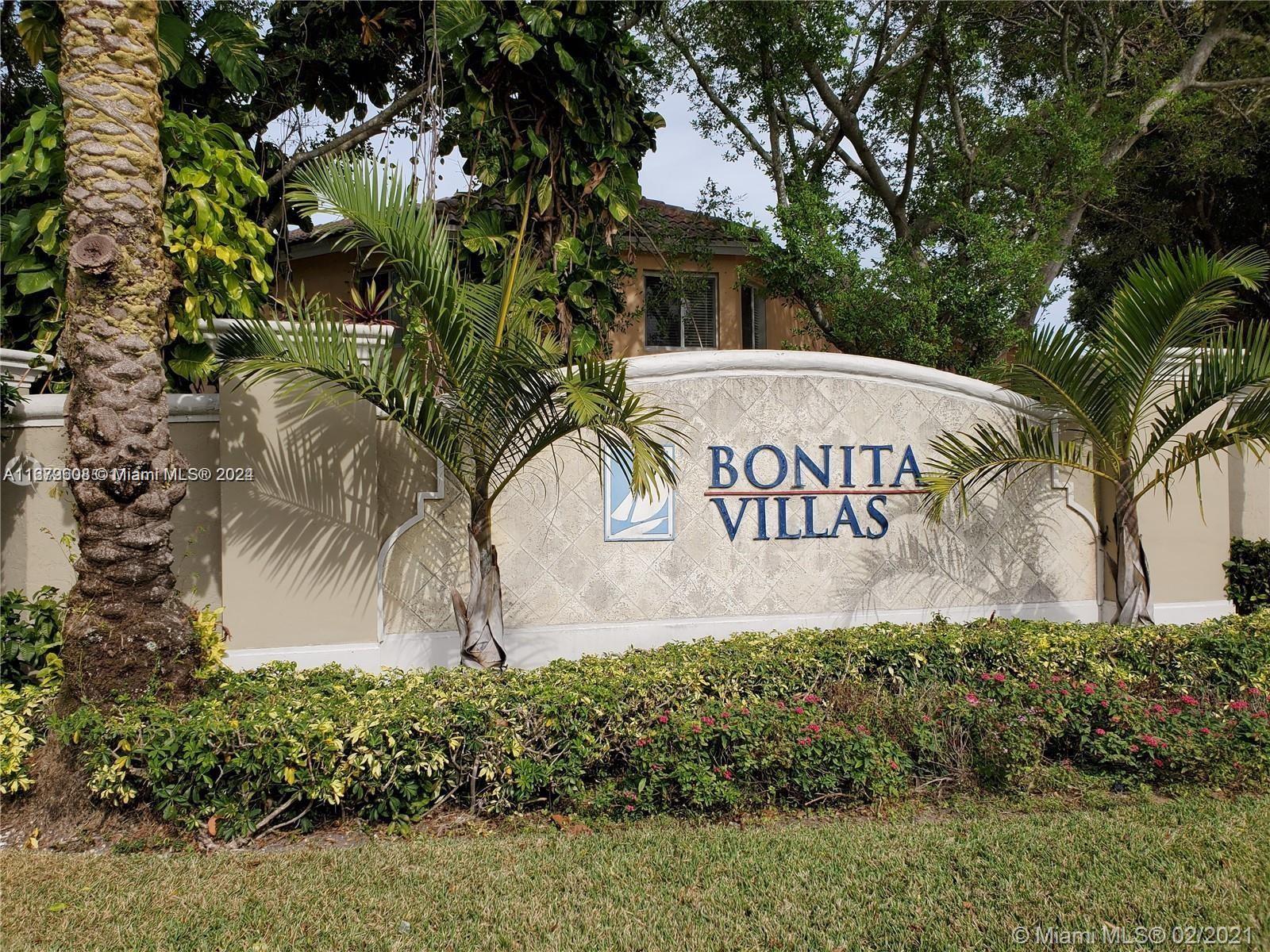 Three Lakes Miami, FL 33186 - Photo 1 of 34 a sign that is next to a road