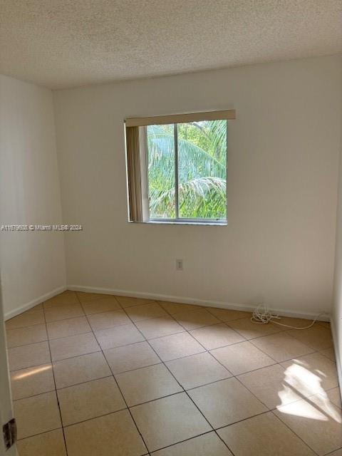 Three Lakes Miami, FL 33186 - Photo 18 of 34 a view of an empty room with a window
