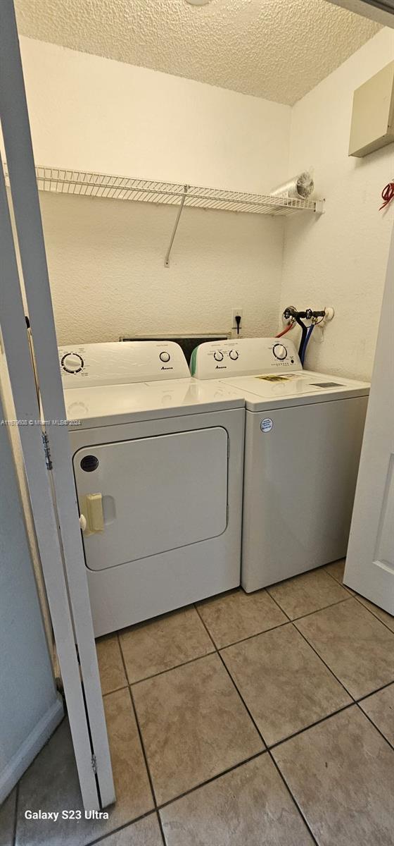 Three Lakes Miami, FL 33186 - Photo 26 of 34 a utility room with washer and dryer
