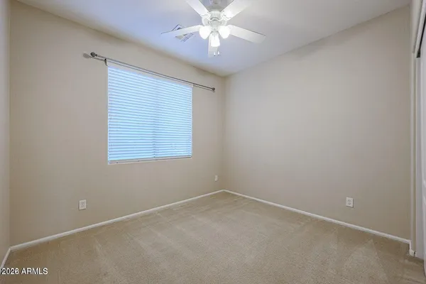 a view of hallway with wooden floor