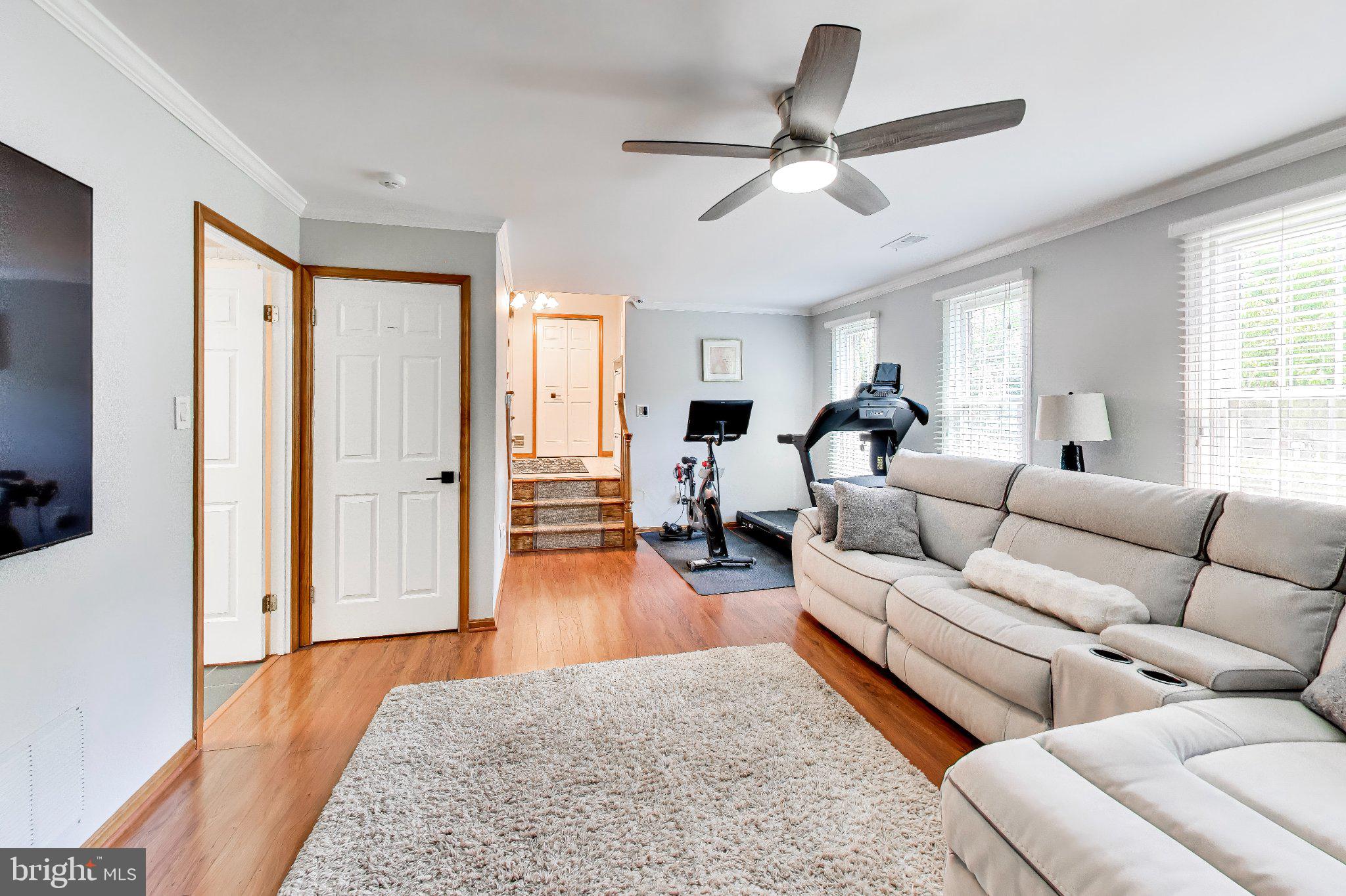 14216 Alderton Road Silver Spring, MD 20906 - Photo 20 of 63 a living room with furniture and a large window