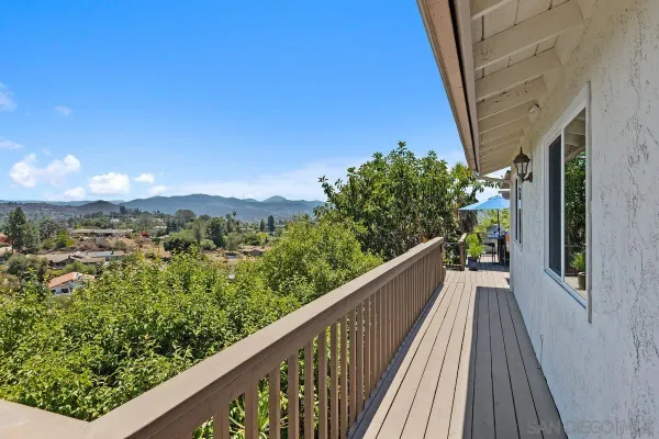 a view of a balcony with an outdoor space