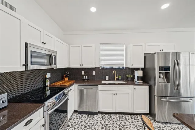 a bedroom with a bed and a walk in closet
