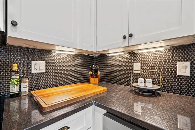 a bedroom with a bed and a desk