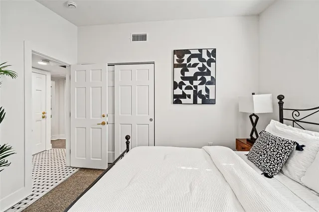 a view of a house with a yard and garden