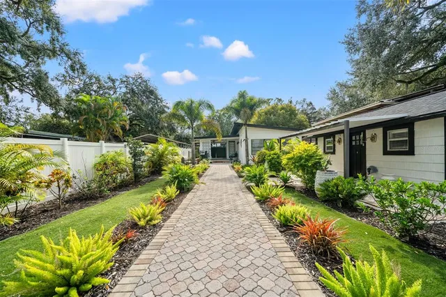 a view of a roof deck with wooden floor and fence