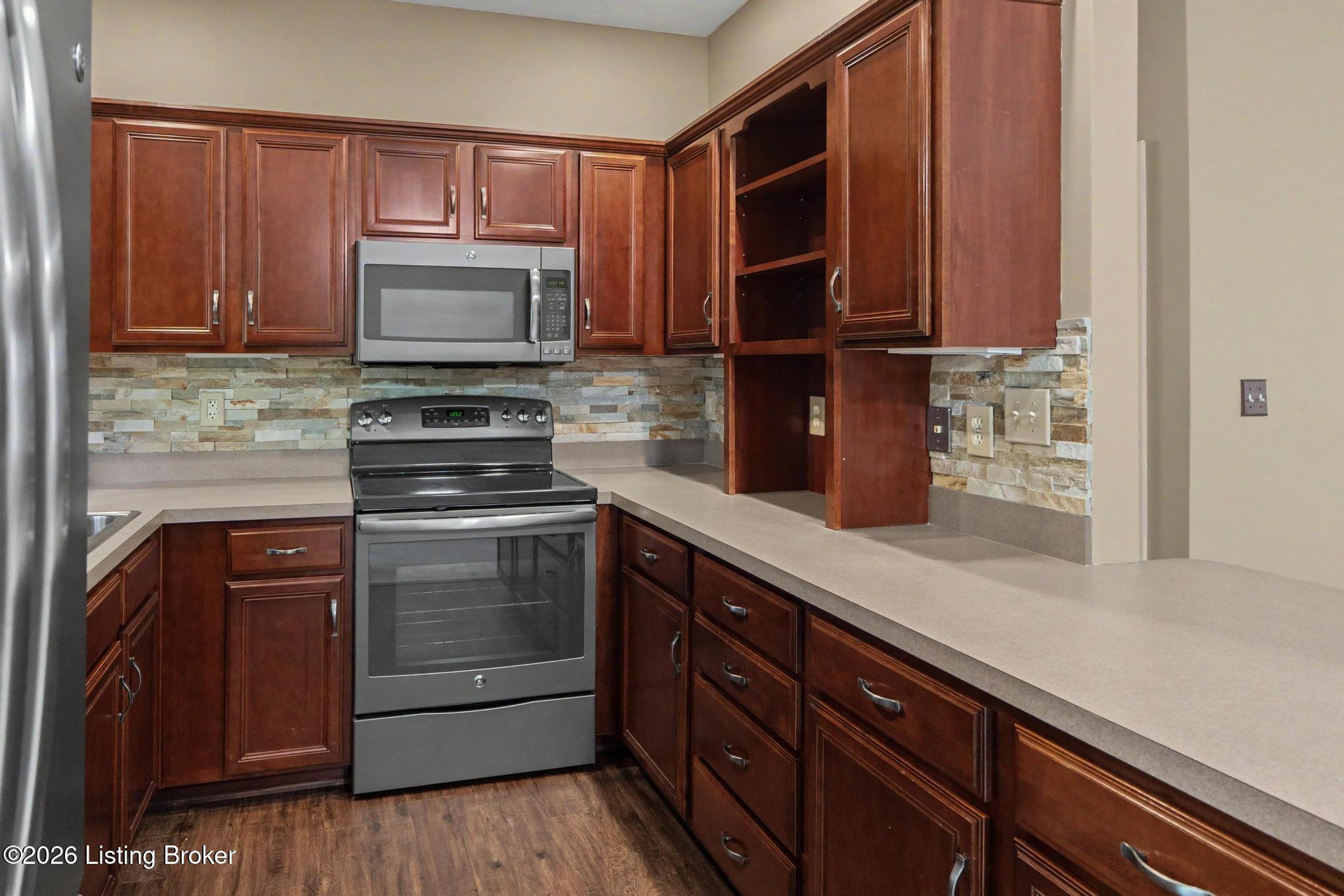 3112 Hendon Road Louisville, KY 40220 - Photo 5 of 26 Fresh finishes meet everyday function with professionally refinished cabinetry, sleek new hardware, and stainless steel appliances.