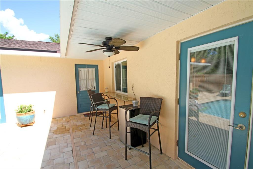 783 Northwest Spruce Ridge Drive Stuart, FL 34994 - Photo 15 of 29 a view of an outdoor space with seating area