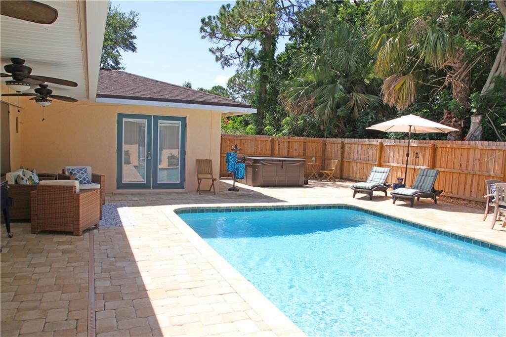 783 Northwest Spruce Ridge Drive Stuart, FL 34994 - Photo 23 of 29 a view of swimming pool with seating space and furniture