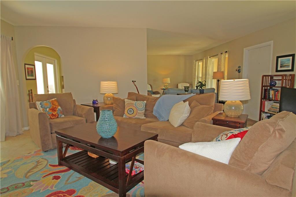 783 Northwest Spruce Ridge Drive Stuart, FL 34994 - Photo 4 of 29 a living room with furniture