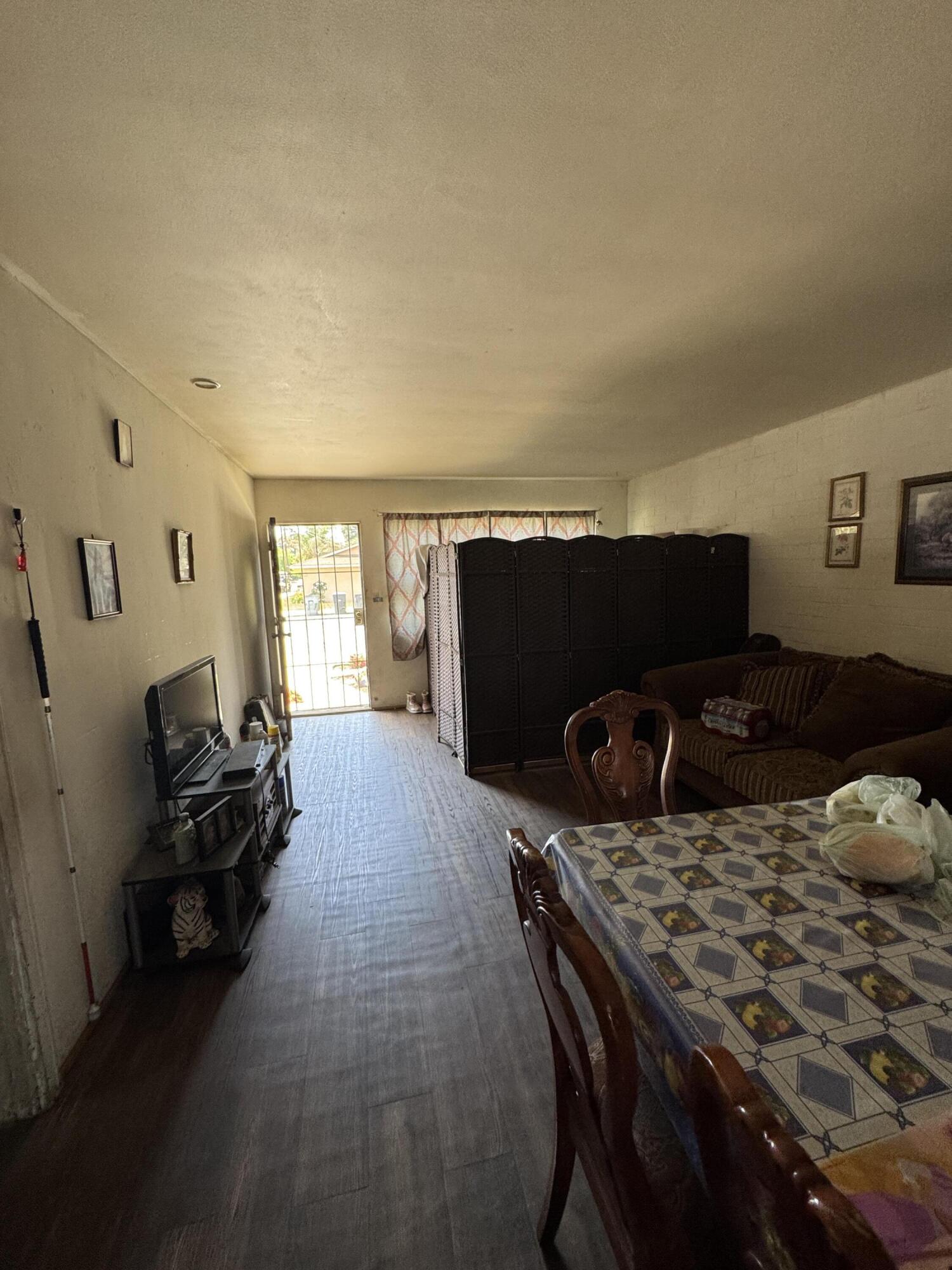 704 North Floral Street Visalia, CA 93291 - Photo 36 of 51 a living room with furniture and a fireplace