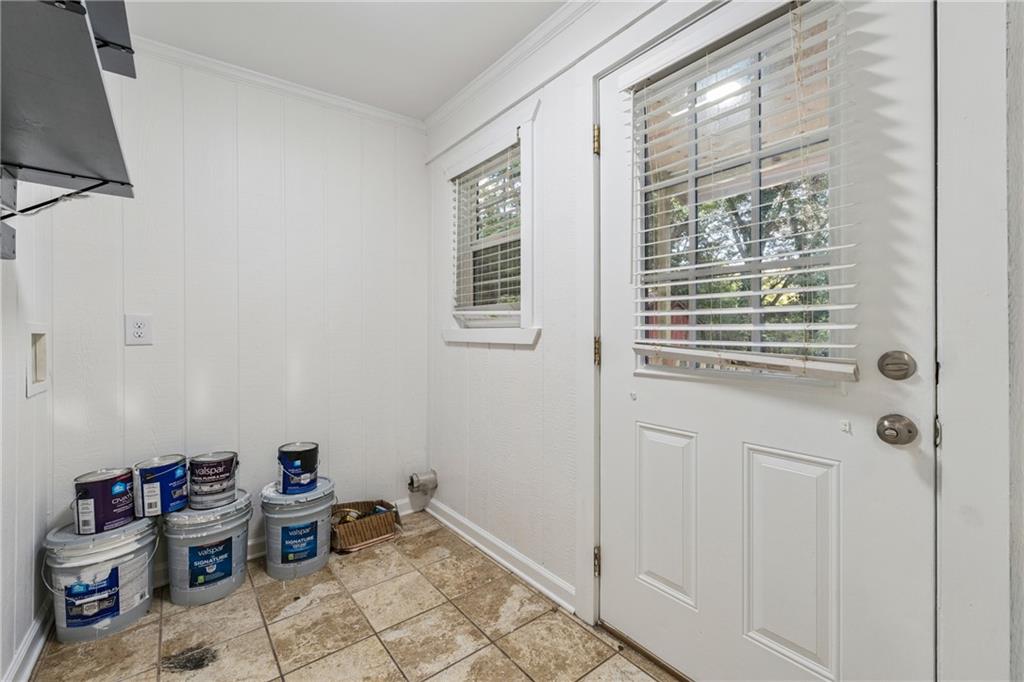 1820 Cassville Road Northwest Cartersville, GA 30121 - Photo 19 of 24 a view of a room with rack on the wall and a window