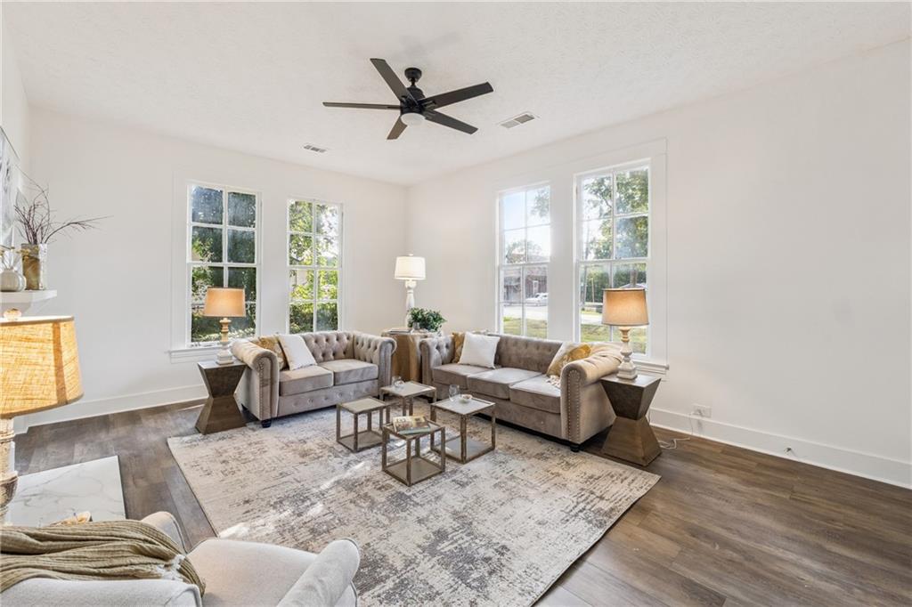1820 Cassville Road Northwest Cartersville, GA 30121 - Photo 5 of 24 a living room with furniture and a large window