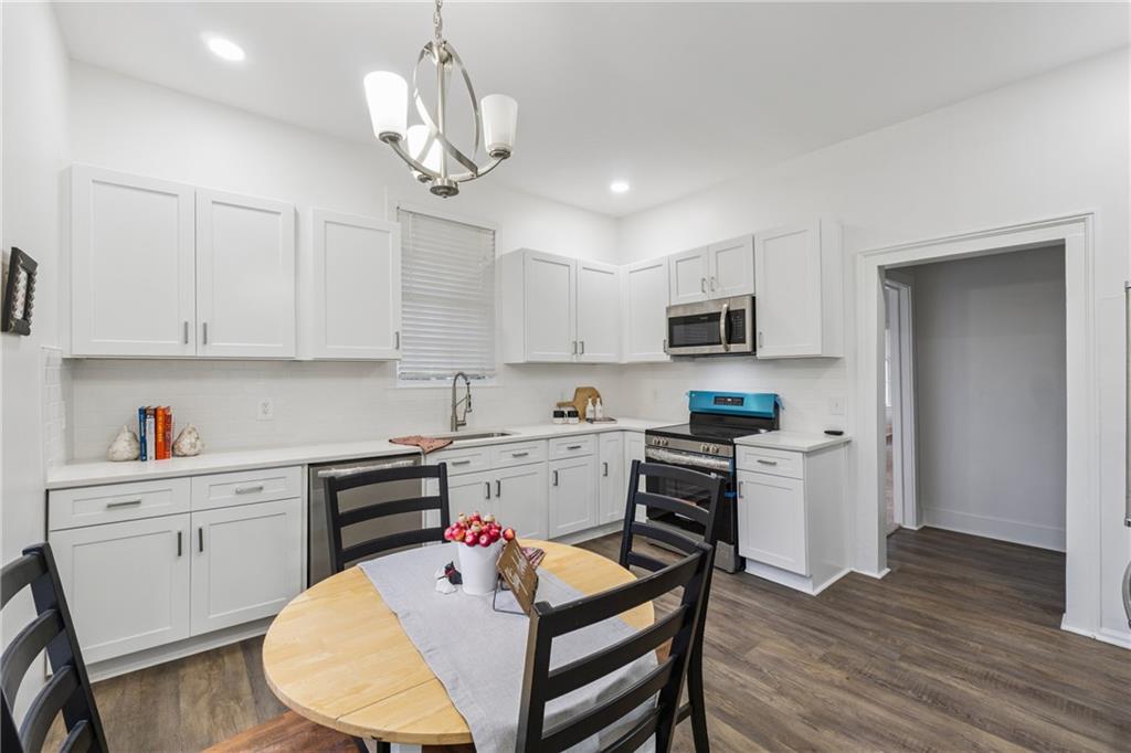 1820 Cassville Road Northwest Cartersville, GA 30121 - Photo 8 of 24 a kitchen with a center island appliances and cabinets