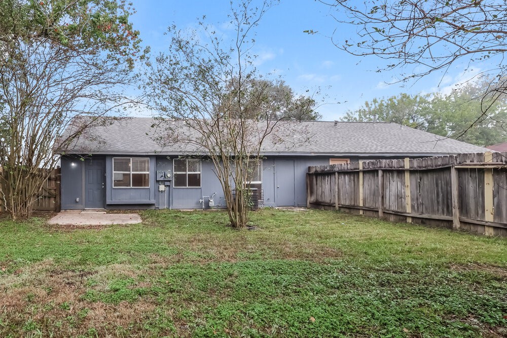 2438 Autumn Springs Lane Spring, TX 77373 - Photo 16 of 16 a view of a house with a yard
