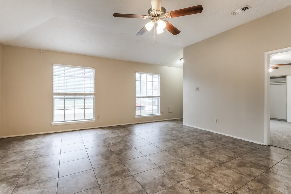2438 Autumn Springs Lane Spring, TX 77373 - Photo 4 of 16 a view of an empty room with a window