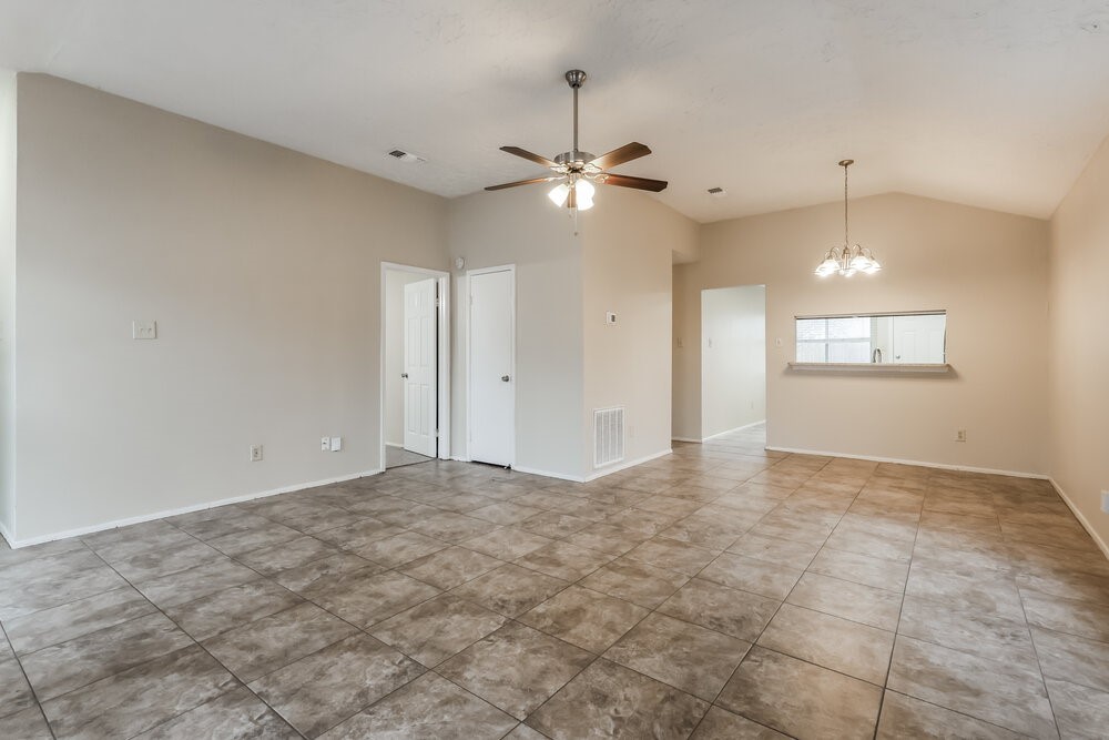 2438 Autumn Springs Lane Spring, TX 77373 - Photo 5 of 16 a view of an empty room with a window