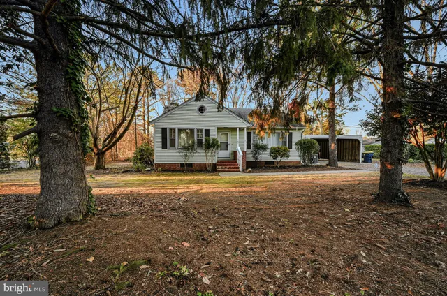 a house with trees in front of it