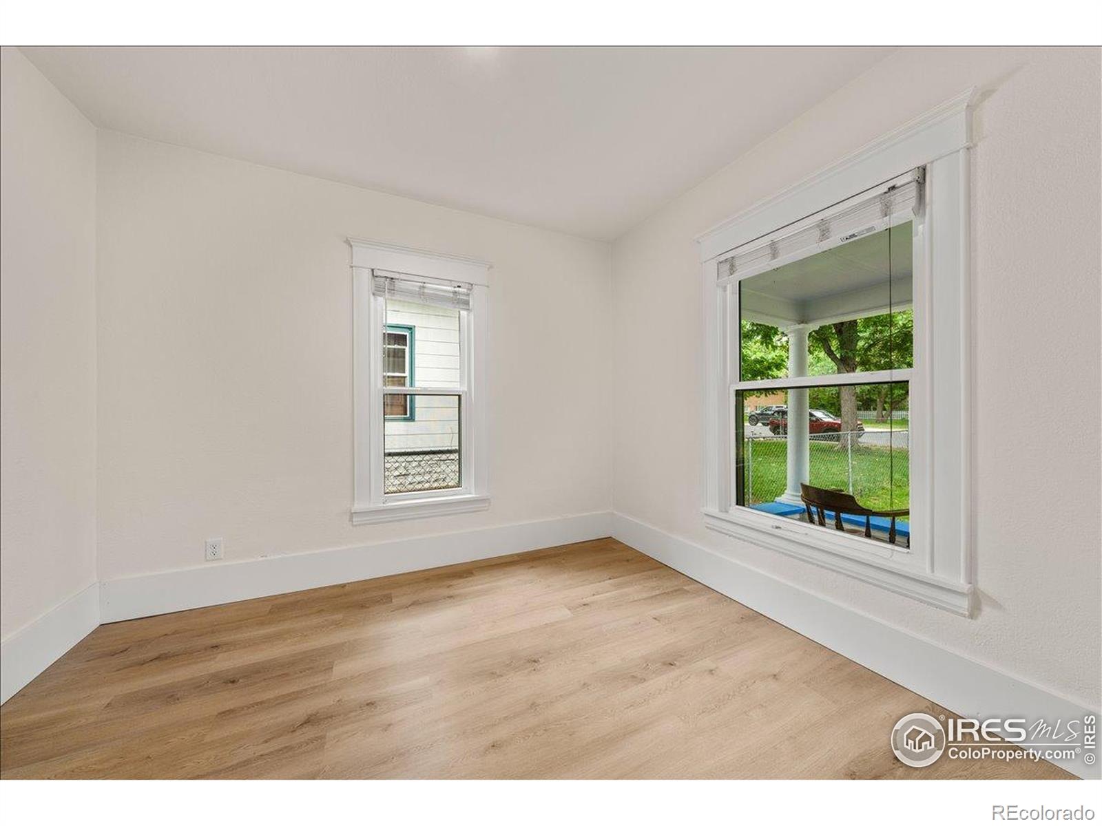 727 Baker Street Longmont, CO 80501 - Photo 13 of 25 a view of an empty room with a window