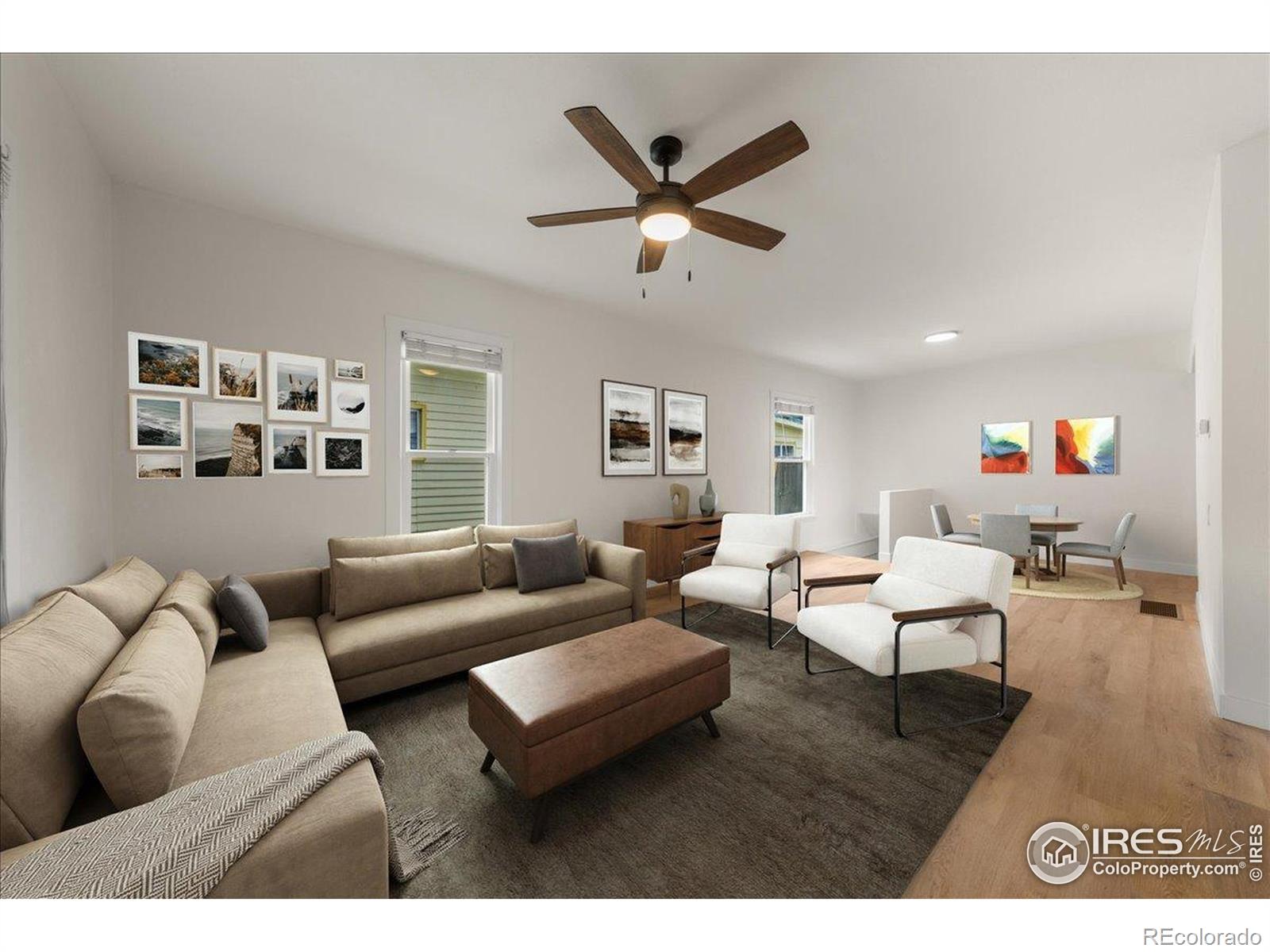 727 Baker Street Longmont, CO 80501 - Photo 5 of 25 a living room with furniture and a window