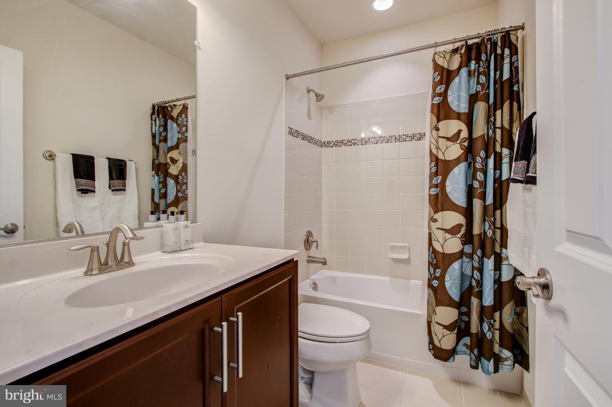 8391 Edward Carr Court Springfield, VA 22153 - Photo 52 of 67 Full bathroom with tub in basement
