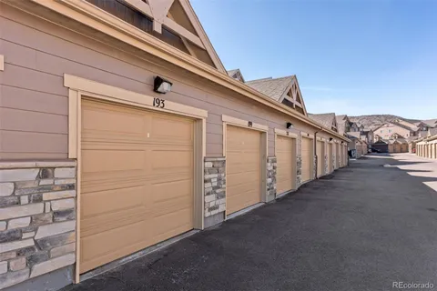 a view of a house with a garage