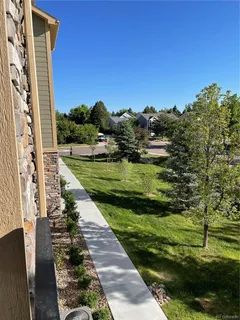 a view of a lake with a big yard