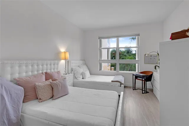 a white bath tub sitting next to a window