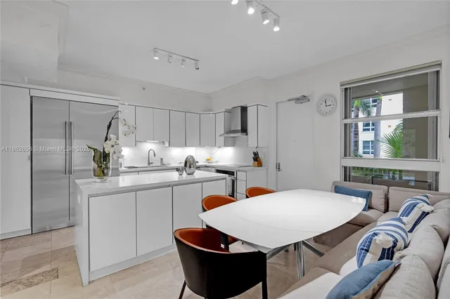 a view of room with window and furniture