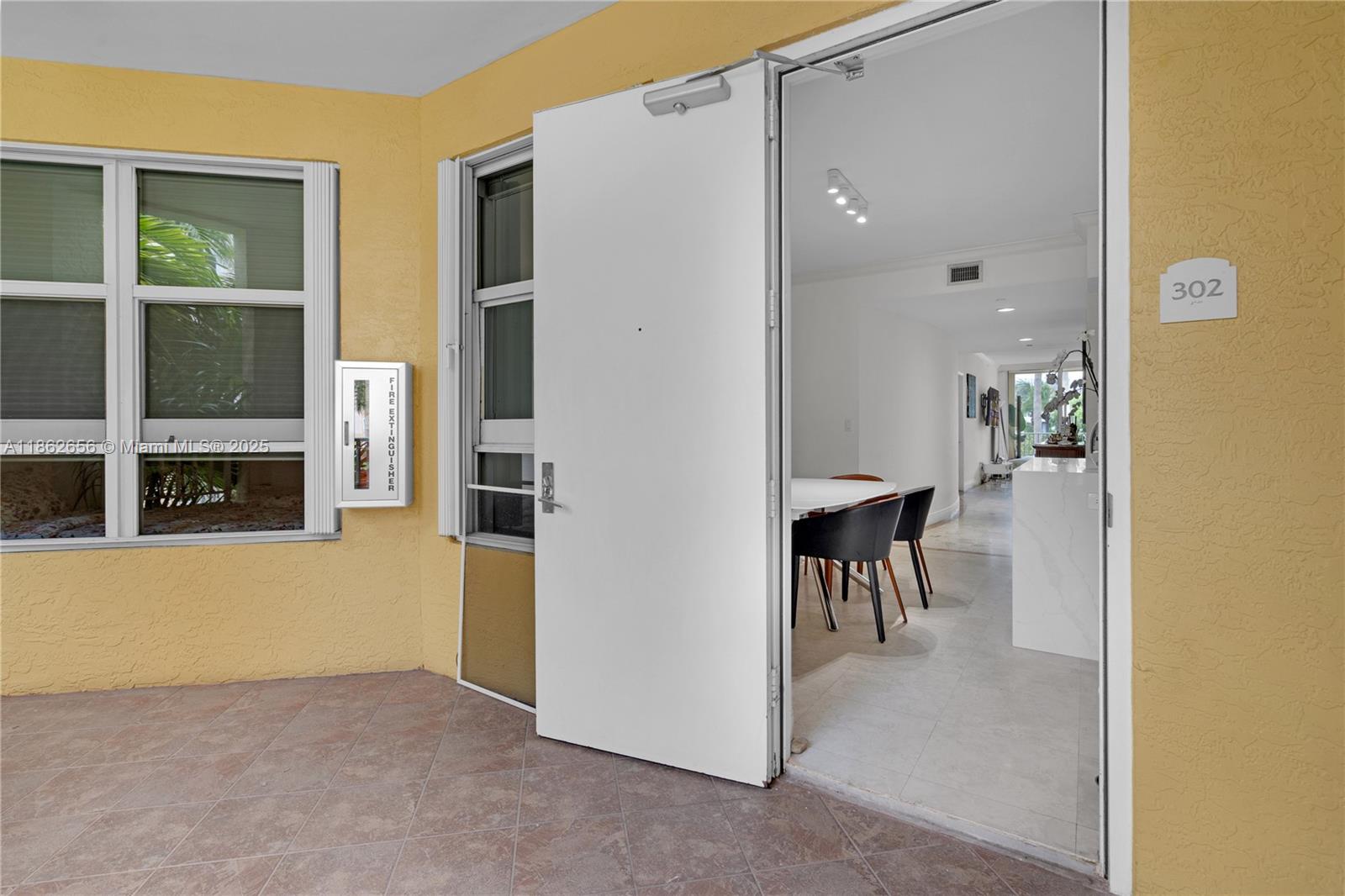 701 Crandon Boulevard, Unit 302 Key Biscayne, FL 33149 - Photo 34 of 46 a view of livingroom with furniture and windows