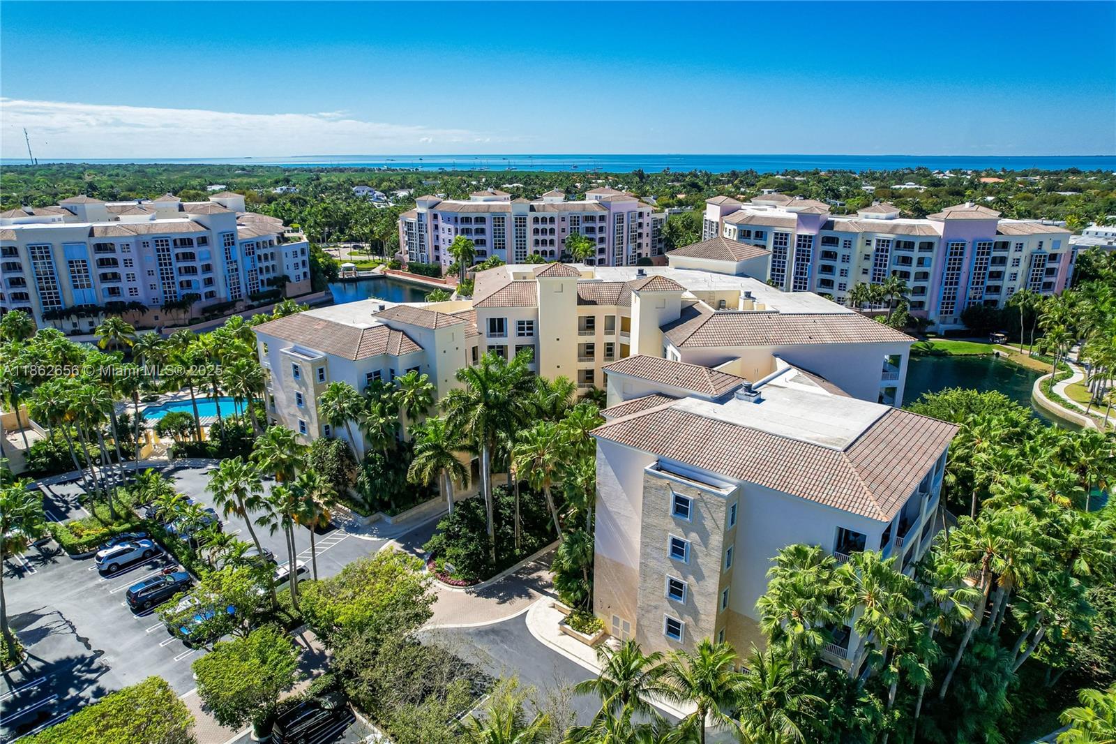 701 Crandon Boulevard, Unit 302 Key Biscayne, FL 33149 - Photo 4 of 46 an aerial view of a house with yard and ocean view