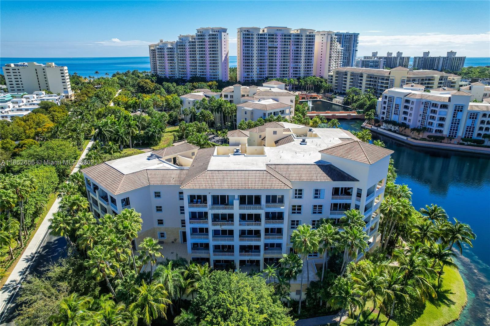 701 Crandon Boulevard, Unit 302 Key Biscayne, FL 33149 - Photo 5 of 46 a view of a patio with plants and city view