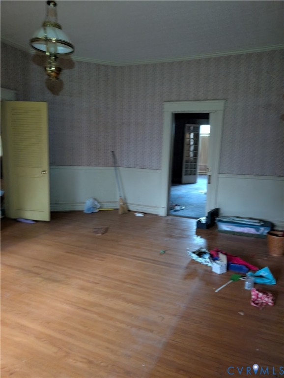 Hardwood flooring, crown molding, chair rail, over