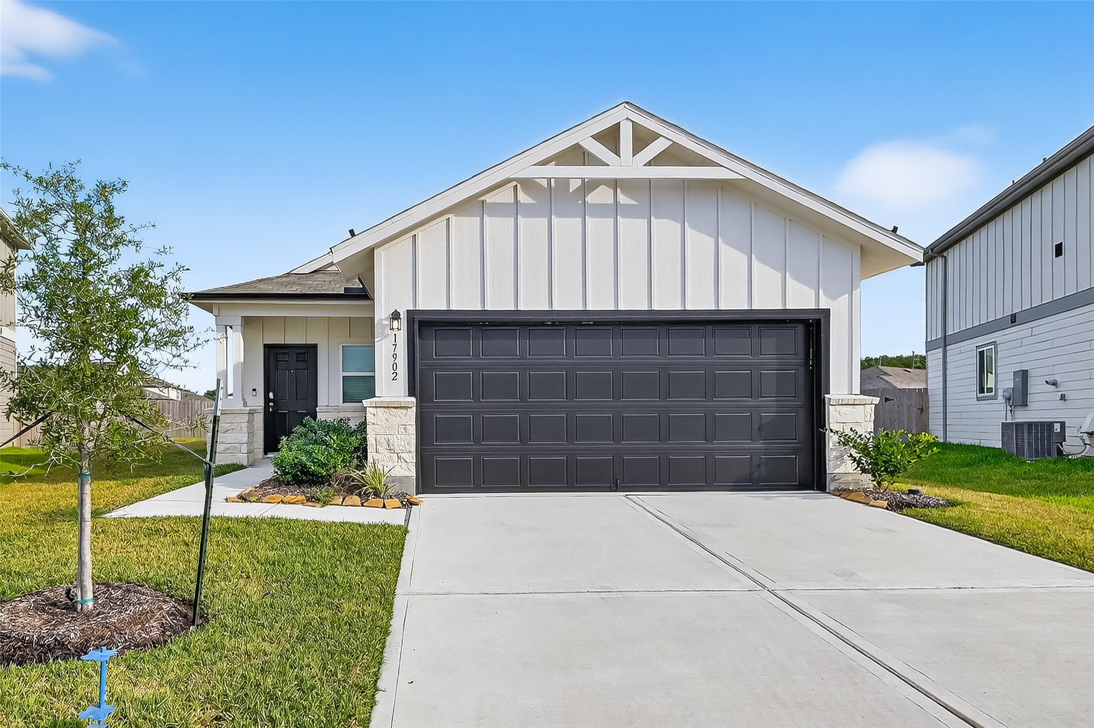 17902 Slurry Rake Lane Hockley, TX 77447 - Photo 4 of 32 a front view of a house with garden