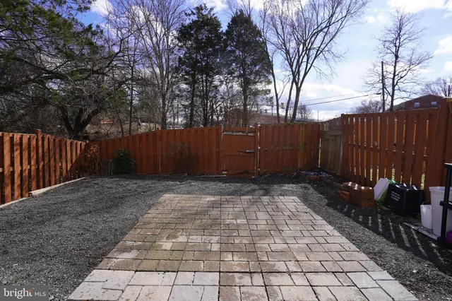 a view of backyard with green space