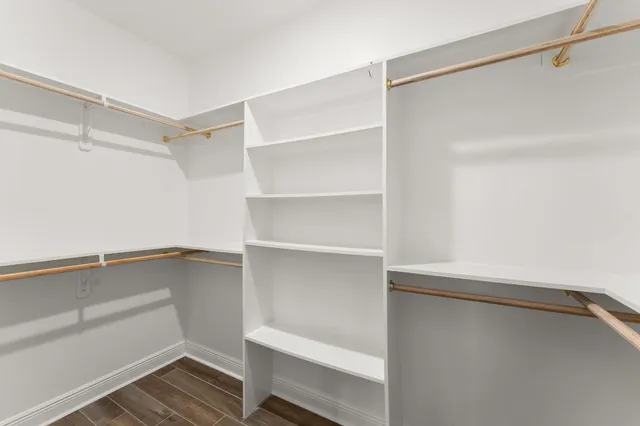 a view of a backyard with a fence