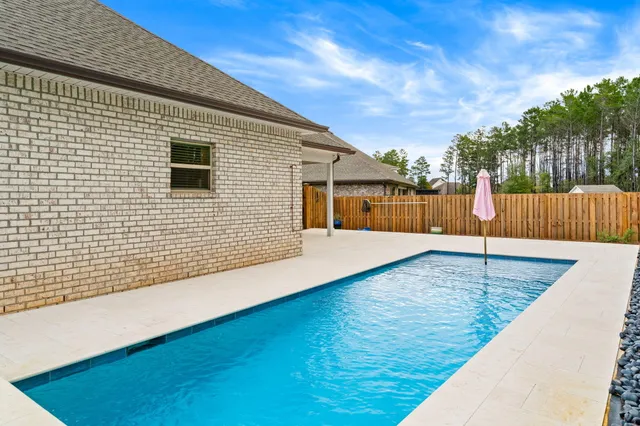 a view of a building with a swimming pool