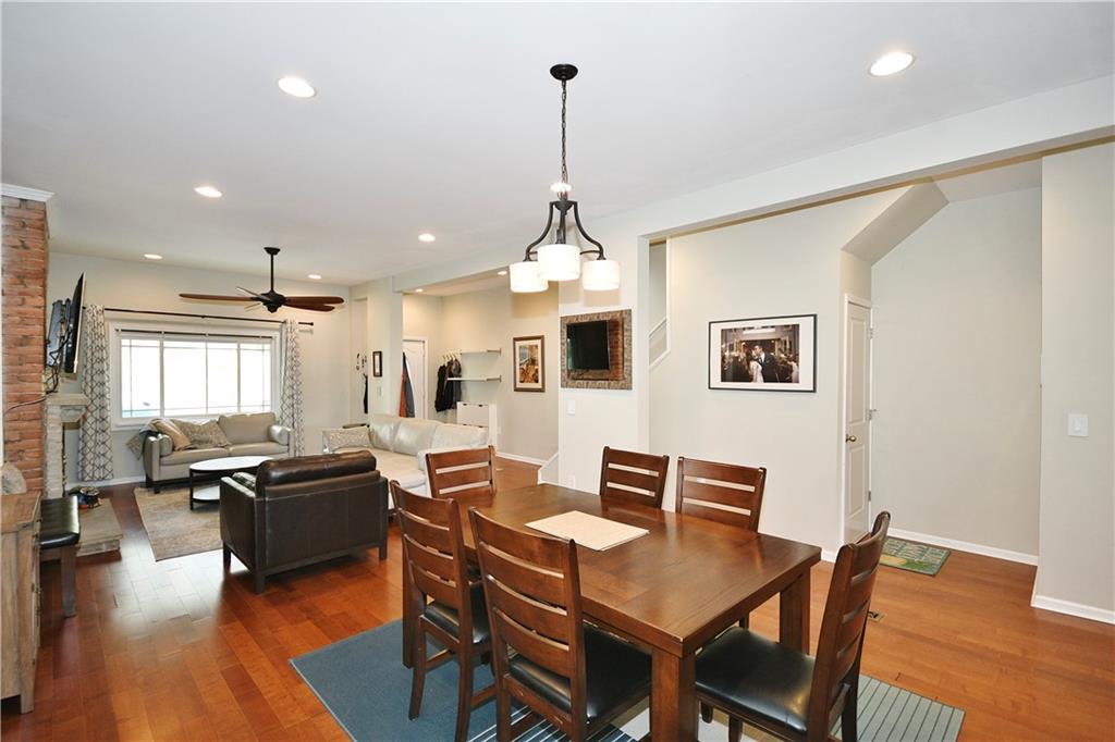 1411 Eleanor Street Pittsburgh, PA 15210 - Photo 5 of 23 a view of a dining room with furniture window and wooden floor