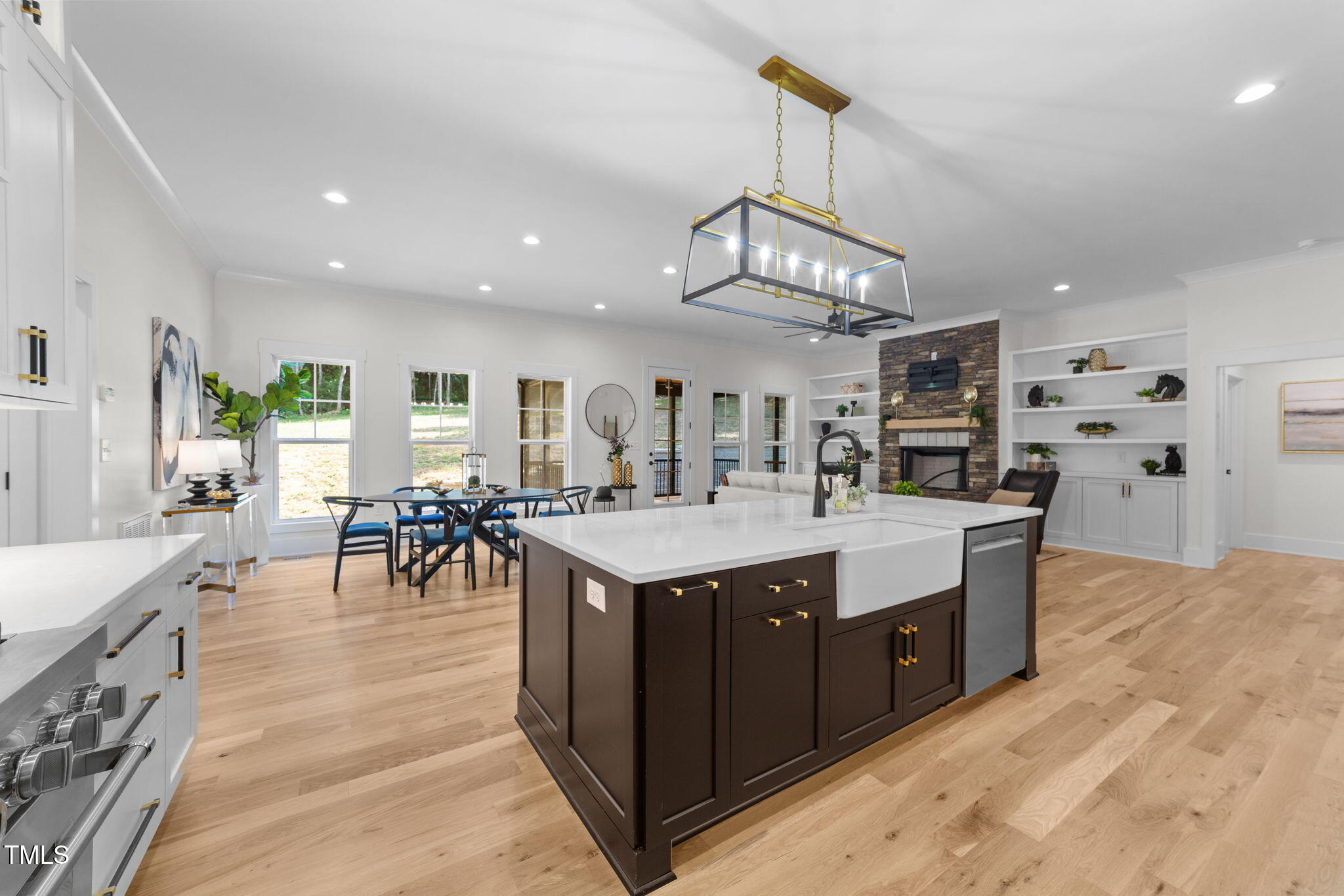 2817 Silk Hope Gum Springs Road Pittsboro, NC 27312 - Photo 16 of 56 a large kitchen with lots of counter top space