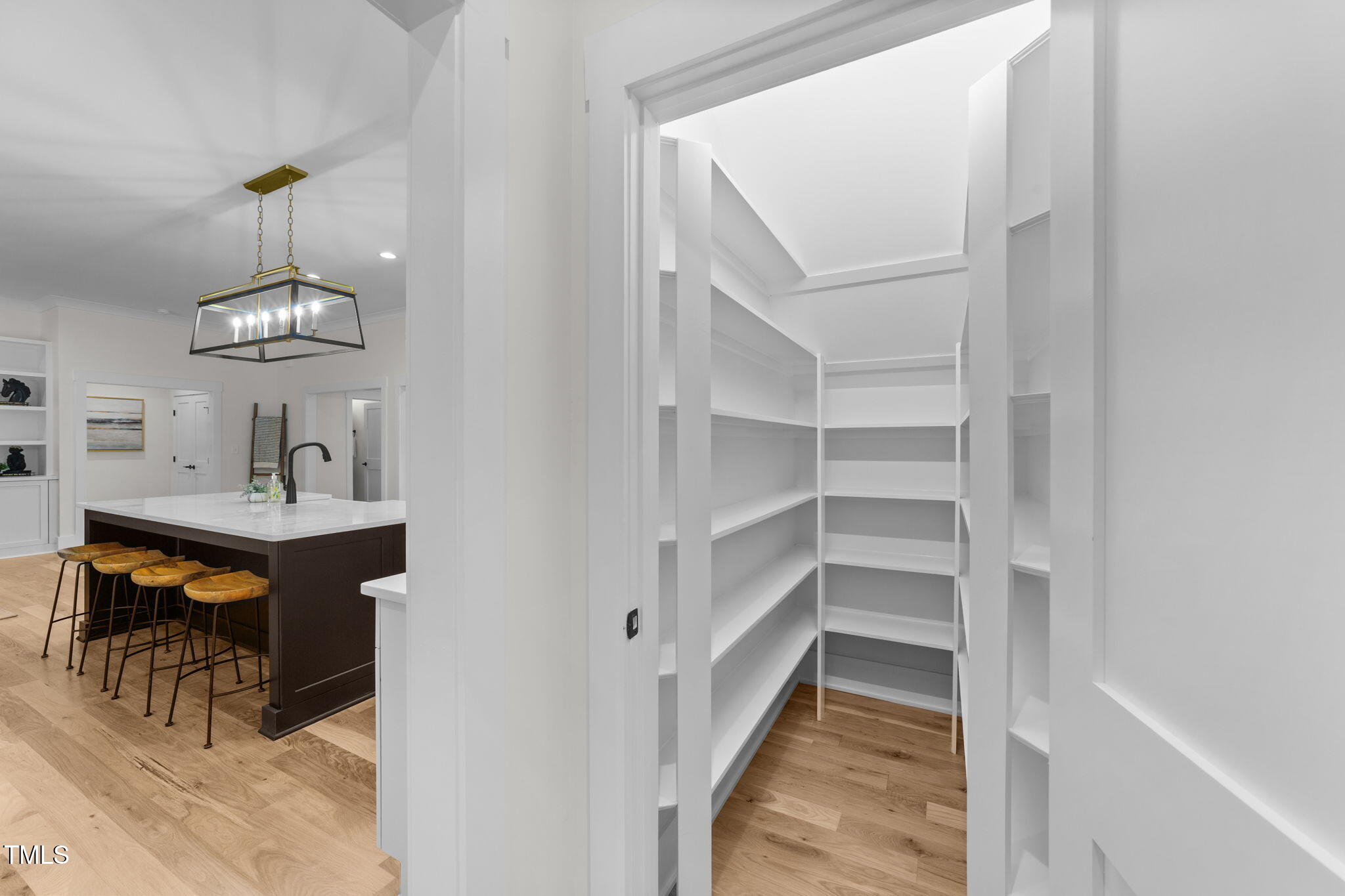2817 Silk Hope Gum Springs Road Pittsboro, NC 27312 - Photo 19 of 56 a view of a livingroom with furniture and chandelier fan