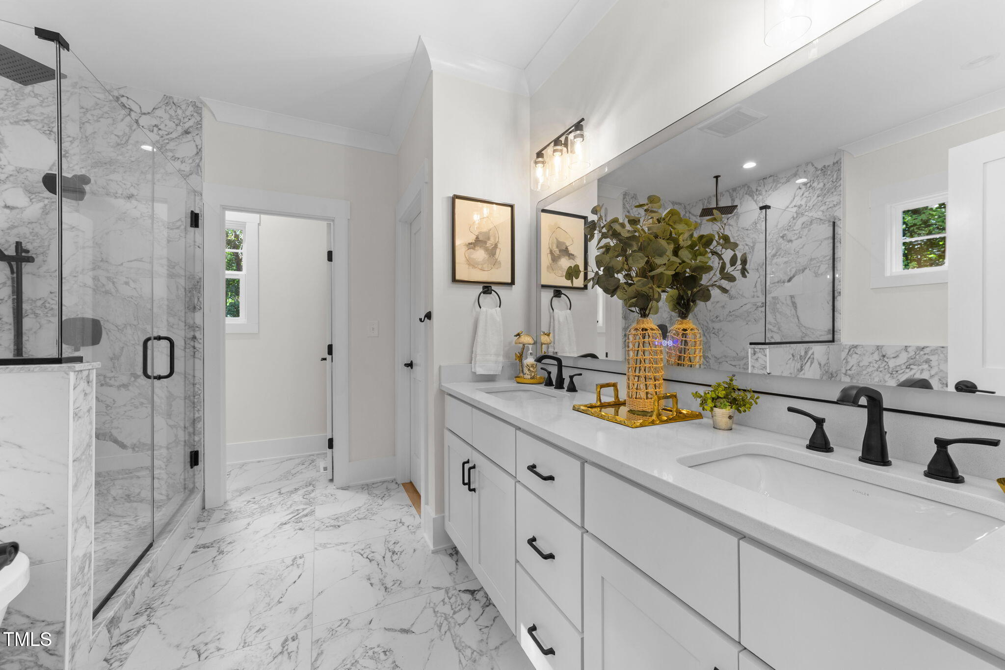 2817 Silk Hope Gum Springs Road Pittsboro, NC 27312 - Photo 23 of 56 a bathroom with a double vanity sink mirror and shower