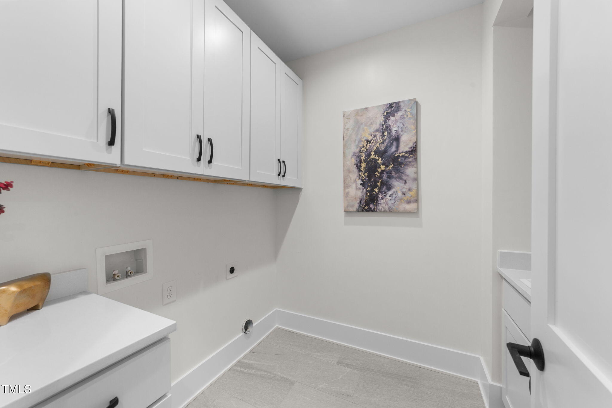 2817 Silk Hope Gum Springs Road Pittsboro, NC 27312 - Photo 27 of 56 a view of cabinets and workspace