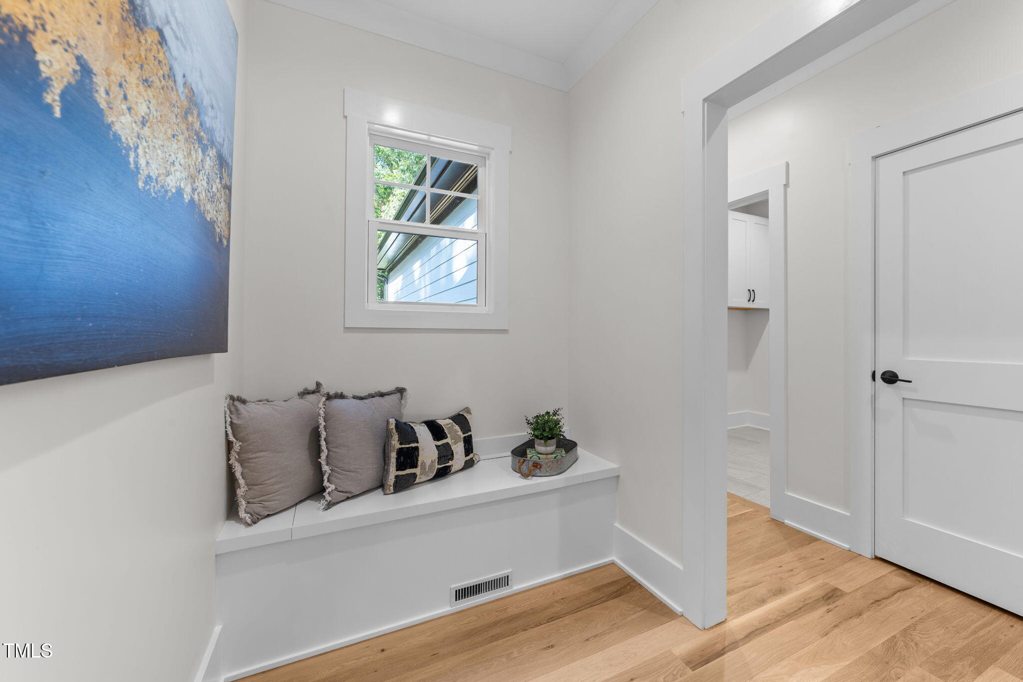 2817 Silk Hope Gum Springs Road Pittsboro, NC 27312 - Photo 29 of 56 a view of hallway with furniture and wooden floor