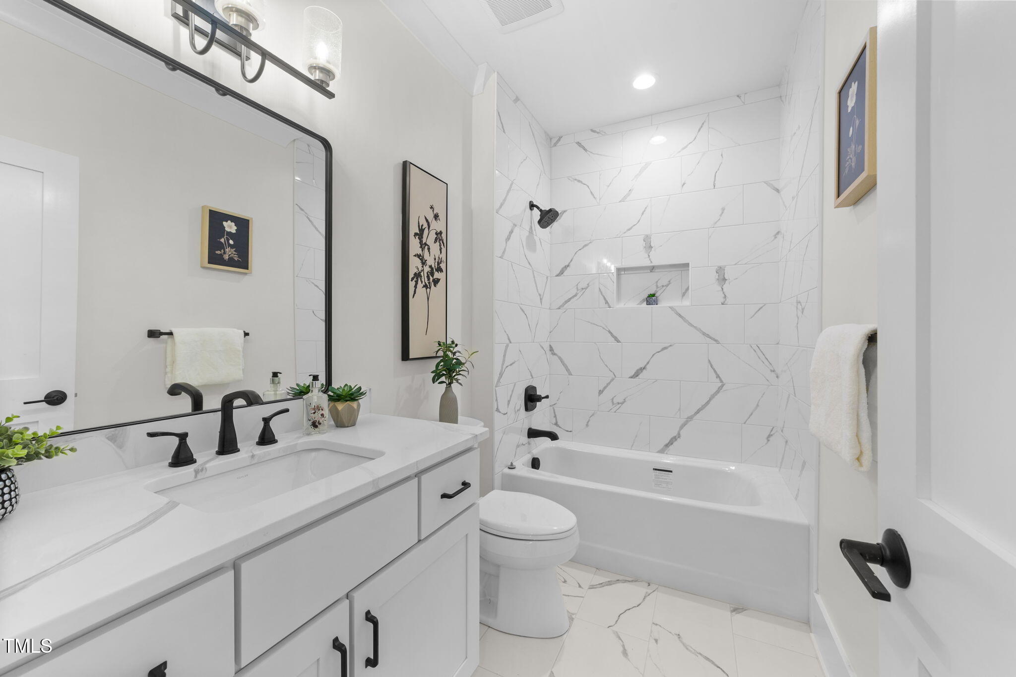 2817 Silk Hope Gum Springs Road Pittsboro, NC 27312 - Photo 32 of 56 a bathroom with a granite countertop sink a toilet and a bathtub