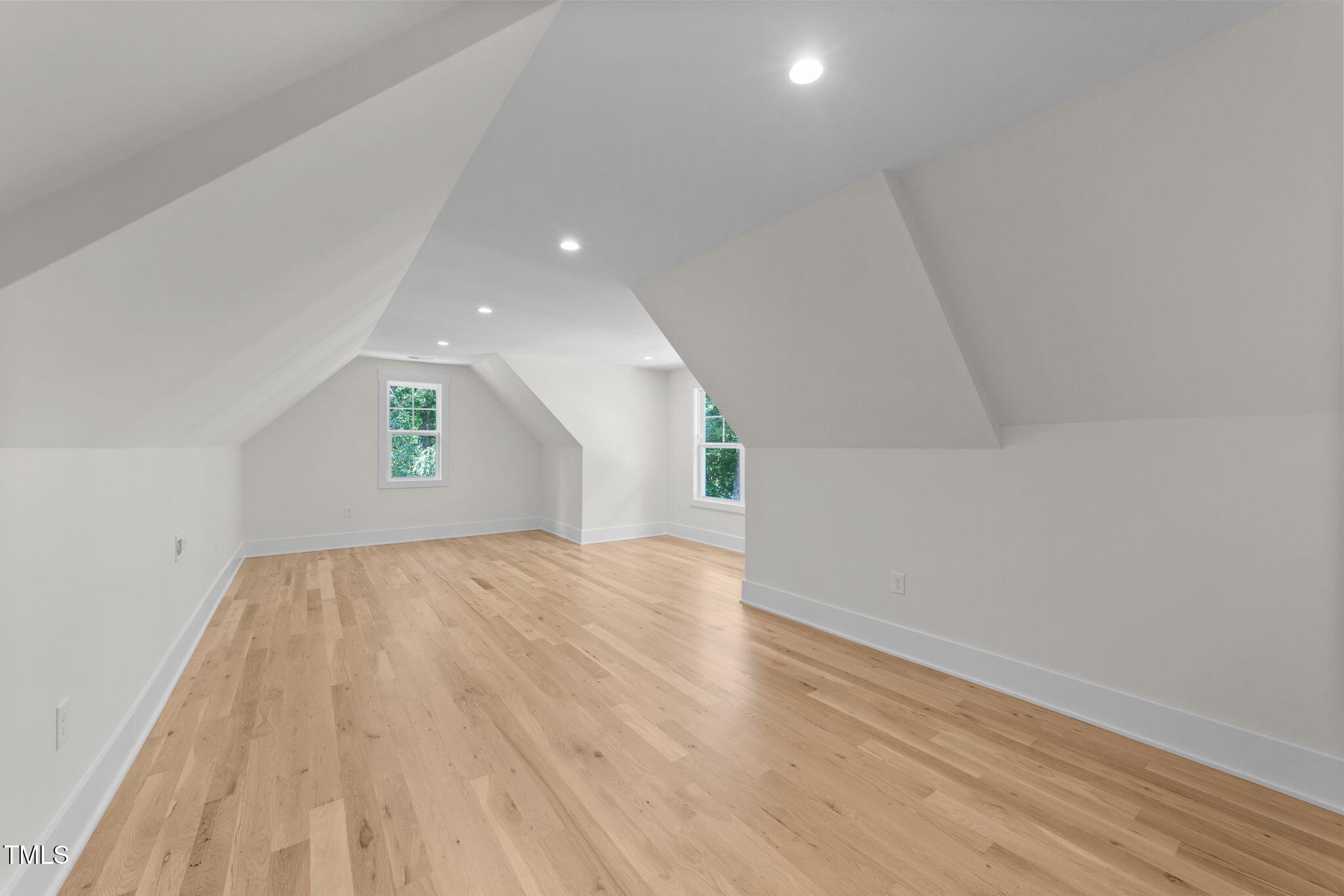 2817 Silk Hope Gum Springs Road Pittsboro, NC 27312 - Photo 38 of 56 a view of an empty room and a window