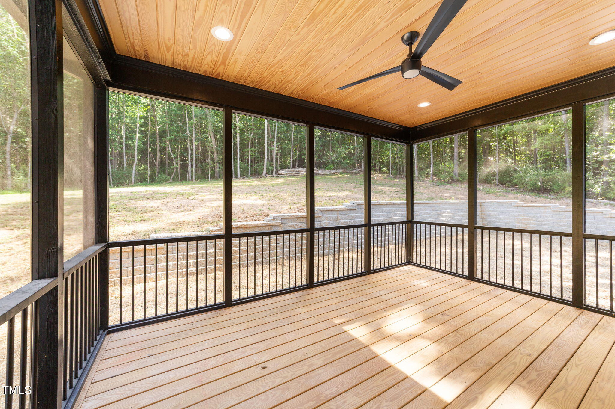 2817 Silk Hope Gum Springs Road Pittsboro, NC 27312 - Photo 40 of 56 a view of a balcony with wooden floor