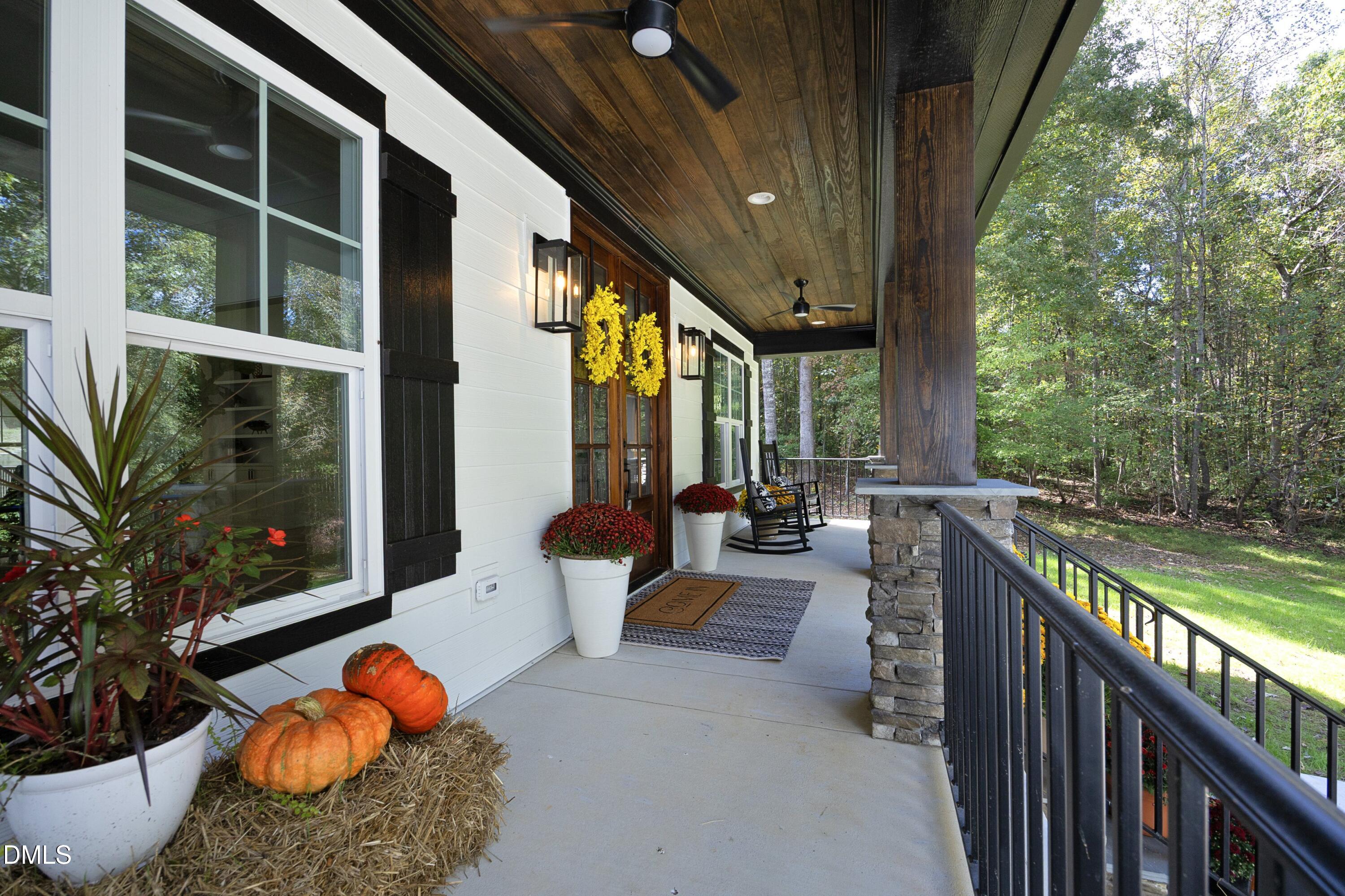 2817 Silk Hope Gum Springs Road Pittsboro, NC 27312 - Photo 5 of 56 a outdoor space with furniture